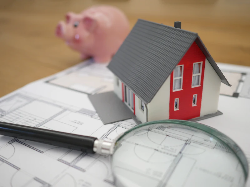 A hand pointing to a line item on a mortgage statement highlighting the VA funding fee